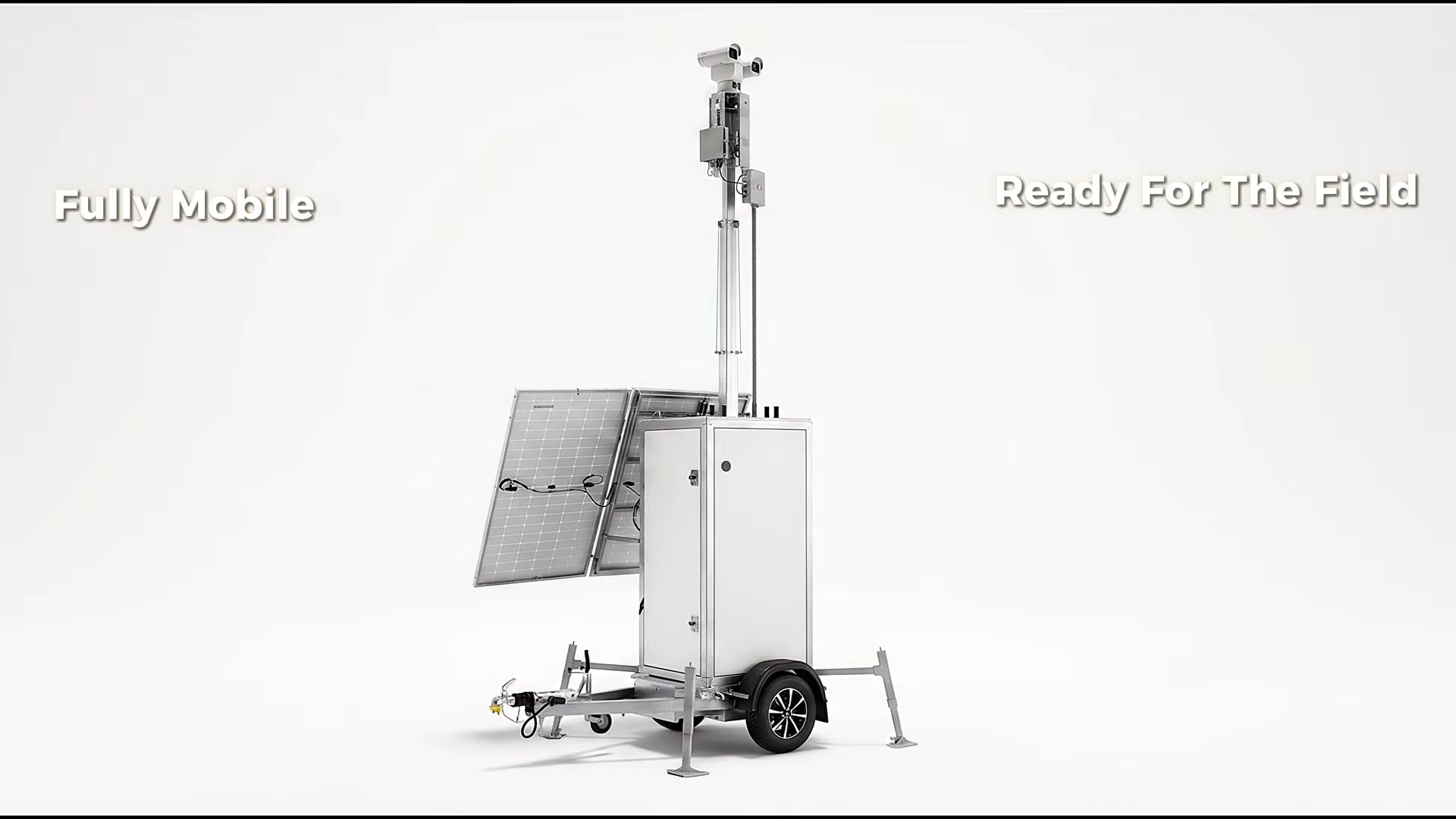 Odin Aero mobile surveillance trailer with mast raised, solar panels deployed.